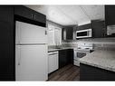 1527-21 Macdonald Drive, Fort Mcmurray, AB  - Indoor Photo Showing Kitchen 