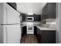 1527-21 Macdonald Drive, Fort Mcmurray, AB  - Indoor Photo Showing Kitchen 