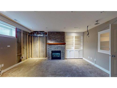 315 Warren Road, Fort Mcmurray, AB - Indoor Photo Showing Living Room With Fireplace