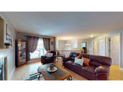 161 Trillium Road, Fort Mcmurray, AB - Indoor Photo Showing Living Room With Fireplace