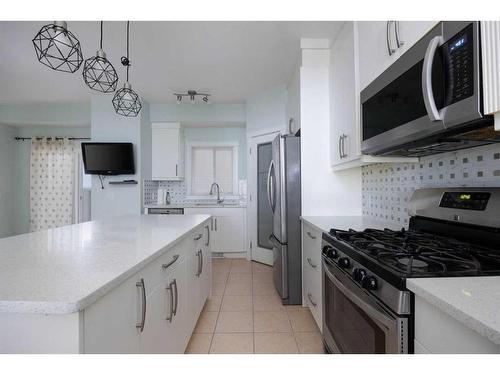 397 Collicott Drive, Fort Mcmurray, AB - Indoor Photo Showing Kitchen With Upgraded Kitchen