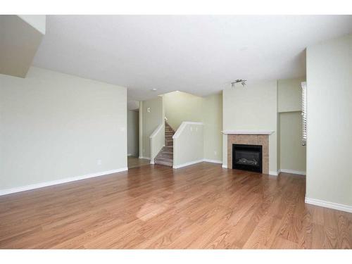 1-240 Laffont Way, Fort Mcmurray, AB - Indoor Photo Showing Living Room With Fireplace