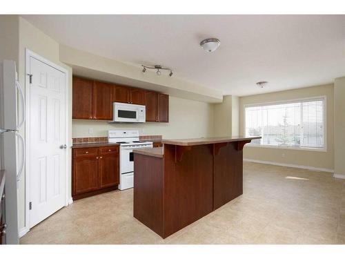 1-240 Laffont Way, Fort Mcmurray, AB - Indoor Photo Showing Kitchen