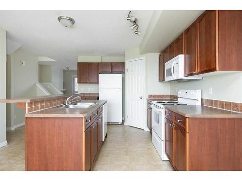 1-240 Laffont Way, Fort Mcmurray, AB - Indoor Photo Showing Kitchen With Double Sink