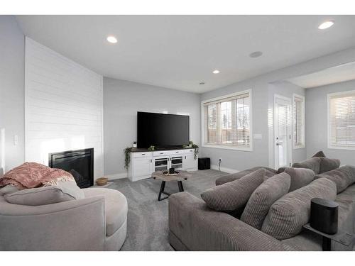 127 Waxwing Rise, Fort Mcmurray, AB - Indoor Photo Showing Living Room With Fireplace