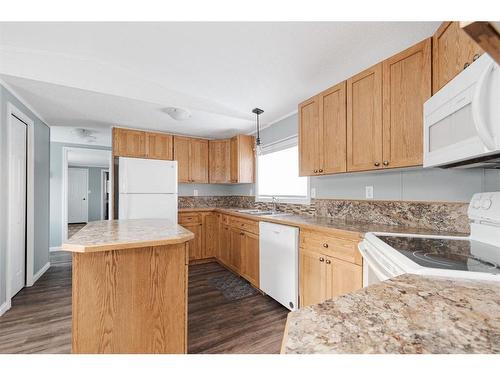 106 Grant Way, Fort Mcmurray, AB - Indoor Photo Showing Kitchen With Double Sink