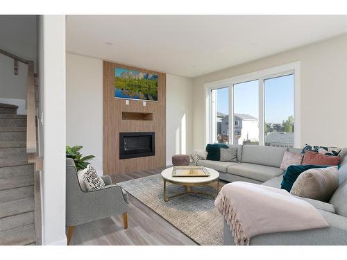 149 Shalestone Place, Fort Mcmurray, AB - Indoor Photo Showing Living Room With Fireplace