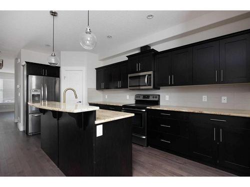 10-401 Sparrow Hawk Drive, Fort Mcmurray, AB - Indoor Photo Showing Kitchen With Upgraded Kitchen