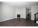 10-401 Sparrow Hawk Drive, Fort Mcmurray, AB  - Indoor Photo Showing Living Room With Fireplace 