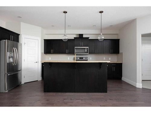 10-401 Sparrow Hawk Drive, Fort Mcmurray, AB - Indoor Photo Showing Kitchen With Upgraded Kitchen