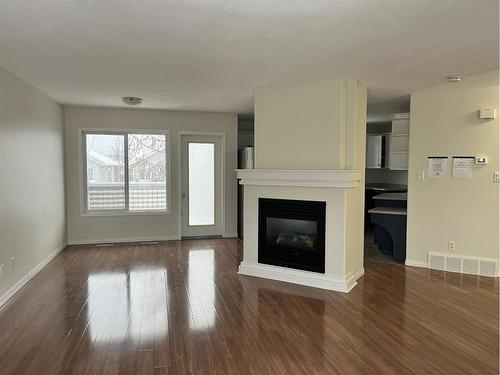 103-104 Loutit Road, Fort Mcmurray, AB - Indoor Photo Showing Living Room With Fireplace