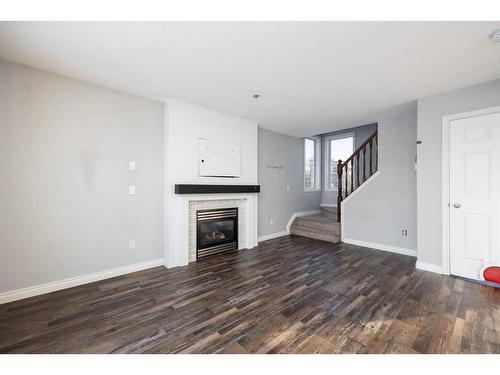 120 Grosbeak Way, Fort Mcmurray, AB - Indoor Photo Showing Living Room With Fireplace