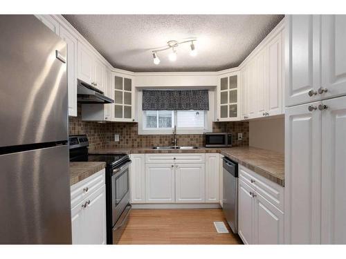 257 Caouette Crescent, Fort Mcmurray, AB - Indoor Photo Showing Kitchen With Double Sink