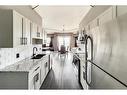 309-8026 Franklin Avenue, Fort Mcmurray, AB  - Indoor Photo Showing Kitchen With Double Sink With Upgraded Kitchen 