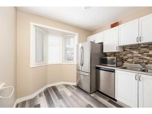 155D Dickins, Fort Mcmurray, AB - Indoor Photo Showing Kitchen With Double Sink