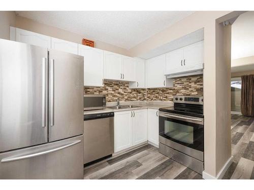 155D Dickins, Fort Mcmurray, AB - Indoor Photo Showing Kitchen With Double Sink With Upgraded Kitchen