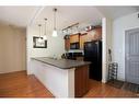 1415-204 Sparrow Hawk Drive, Fort Mcmurray, AB  - Indoor Photo Showing Kitchen With Double Sink 