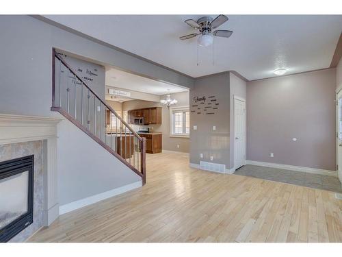 236 Coyote Crescent, Fort Mcmurray, AB - Indoor Photo Showing Other Room With Fireplace