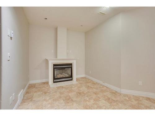 236 Coyote Crescent, Fort Mcmurray, AB - Indoor Photo Showing Living Room With Fireplace