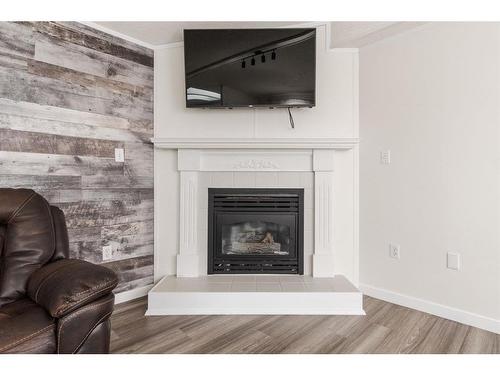 188 Caouette Crescent, Fort Mcmurray, AB - Indoor Photo Showing Living Room With Fireplace