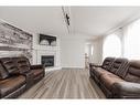 188 Caouette Crescent, Fort Mcmurray, AB  - Indoor Photo Showing Living Room With Fireplace 