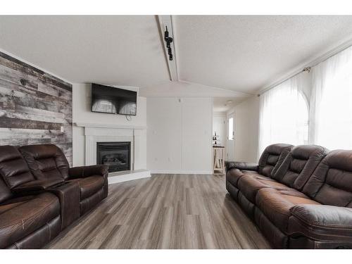 188 Caouette Crescent, Fort Mcmurray, AB - Indoor Photo Showing Living Room With Fireplace