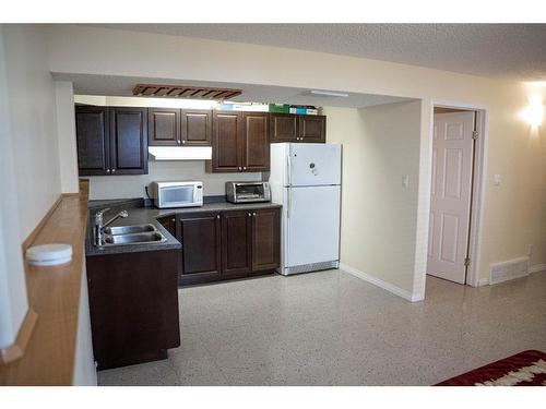 233 Barber Drive, Fort Mcmurray, AB - Indoor Photo Showing Kitchen With Double Sink