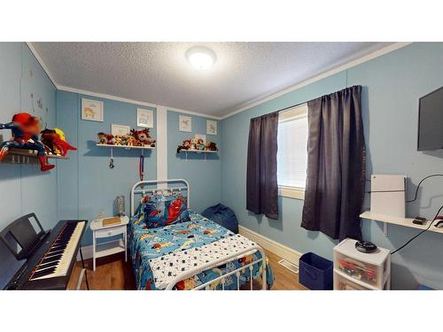 213 Waterhouse Street, Fort Mcmurray, AB - Indoor Photo Showing Bedroom