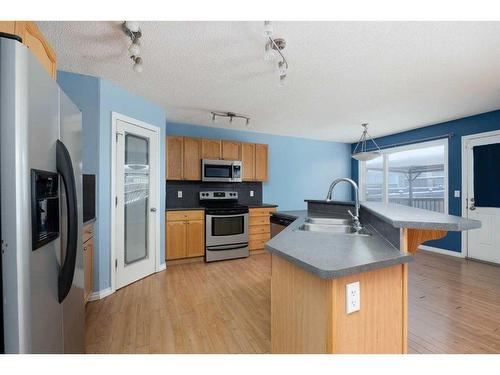 144 Violet Street, Fort Mcmurray, AB - Indoor Photo Showing Kitchen With Double Sink