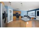 144 Violet Street, Fort Mcmurray, AB  - Indoor Photo Showing Kitchen With Double Sink 