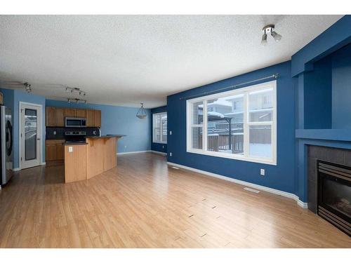 144 Violet Street, Fort Mcmurray, AB - Indoor Photo Showing Living Room With Fireplace