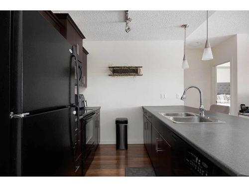 3107-135C Sandpiper Road, Fort Mcmurray, AB - Indoor Photo Showing Kitchen With Double Sink