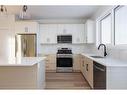 696 Athabasca Avenue, Fort Mcmurray, AB  - Indoor Photo Showing Kitchen With Double Sink 