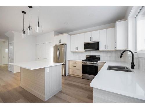 696 Athabasca Avenue, Fort Mcmurray, AB - Indoor Photo Showing Kitchen With Double Sink With Upgraded Kitchen