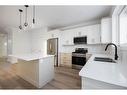 696 Athabasca Avenue, Fort Mcmurray, AB  - Indoor Photo Showing Kitchen With Double Sink With Upgraded Kitchen 