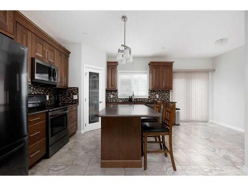 208 Siltstone Place, Fort Mcmurray, AB - Indoor Photo Showing Kitchen