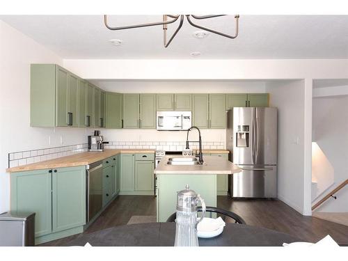 23-97 Wilson Drive, Fort Mcmurray, AB - Indoor Photo Showing Kitchen With Stainless Steel Kitchen With Double Sink