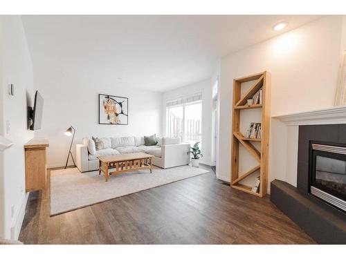 23-97 Wilson Drive, Fort Mcmurray, AB - Indoor Photo Showing Living Room With Fireplace