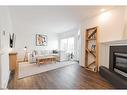 23-97 Wilson Drive, Fort Mcmurray, AB  - Indoor Photo Showing Living Room With Fireplace 