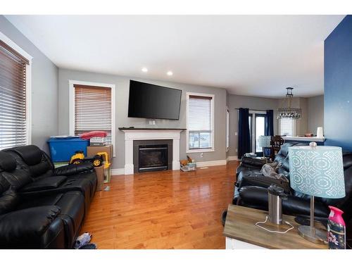 133 Sandhill Place, Fort Mcmurray, AB - Indoor Photo Showing Living Room With Fireplace