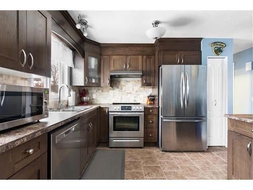 239 Dickins Drive, Fort Mcmurray, AB - Indoor Photo Showing Kitchen With Stainless Steel Kitchen With Double Sink With Upgraded Kitchen