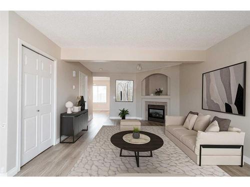 124 Kodiak Crescent, Fort Mcmurray, AB - Indoor Photo Showing Living Room With Fireplace