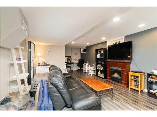 223 Dickins Drive, Fort Mcmurray, AB - Indoor Photo Showing Other Room With Fireplace