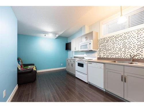 104 Collicott Drive, Fort Mcmurray, AB - Indoor Photo Showing Kitchen With Double Sink