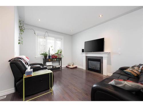 104 Collicott Drive, Fort Mcmurray, AB - Indoor Photo Showing Living Room With Fireplace