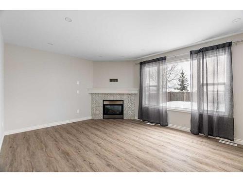 221 Lynx Crescent, Fort Mcmurray, AB - Indoor Photo Showing Living Room With Fireplace