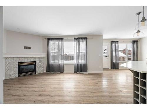 221 Lynx Crescent, Fort Mcmurray, AB - Indoor Photo Showing Living Room With Fireplace