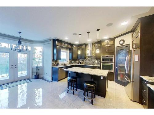 145 Stonecreek Landing, Fort Mcmurray, AB - Indoor Photo Showing Kitchen With Upgraded Kitchen