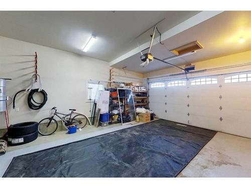 145 Stonecreek Landing, Fort Mcmurray, AB - Indoor Photo Showing Garage