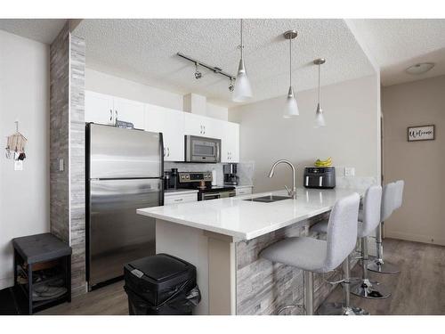 412-136B Sandpiper Road, Fort Mcmurray, AB - Indoor Photo Showing Kitchen With Upgraded Kitchen